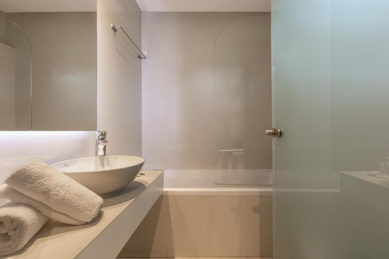 Mythos Suites Hotel Тигаки Экстерьер фото