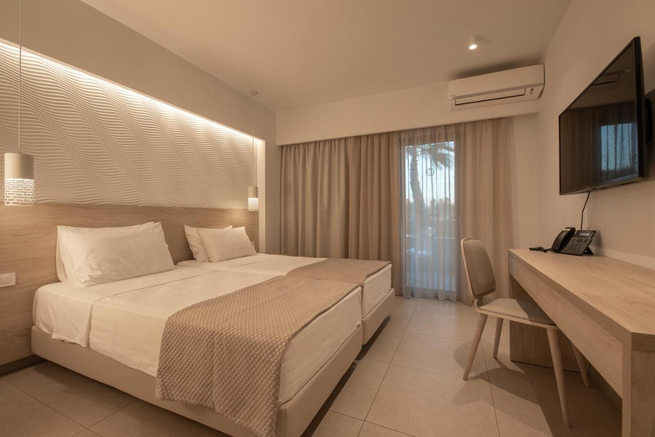 Mythos Suites Hotel Тигаки Экстерьер фото