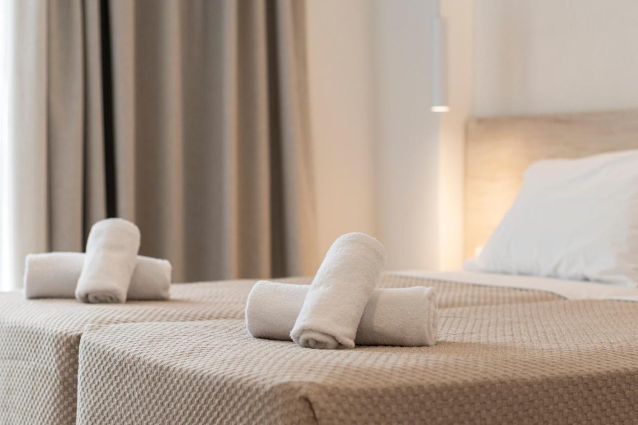 Mythos Suites Hotel Тигаки Экстерьер фото