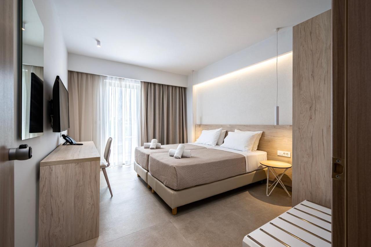 Mythos Suites Hotel Тигаки Экстерьер фото