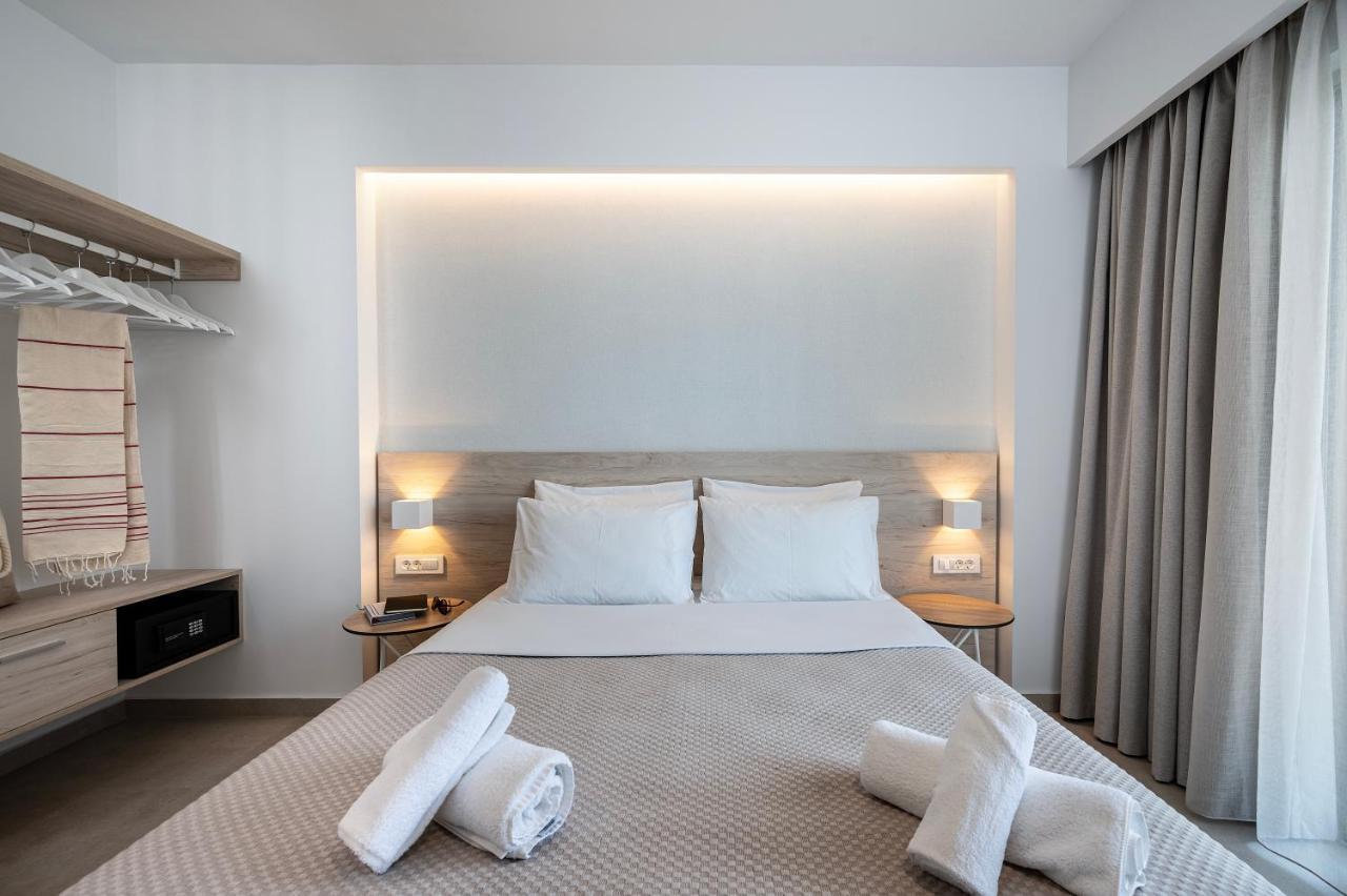Mythos Suites Hotel Тигаки Экстерьер фото