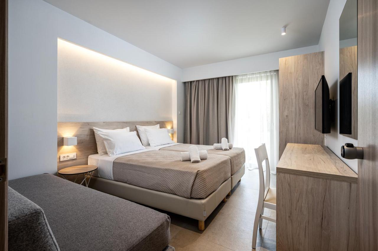 Mythos Suites Hotel Тигаки Экстерьер фото