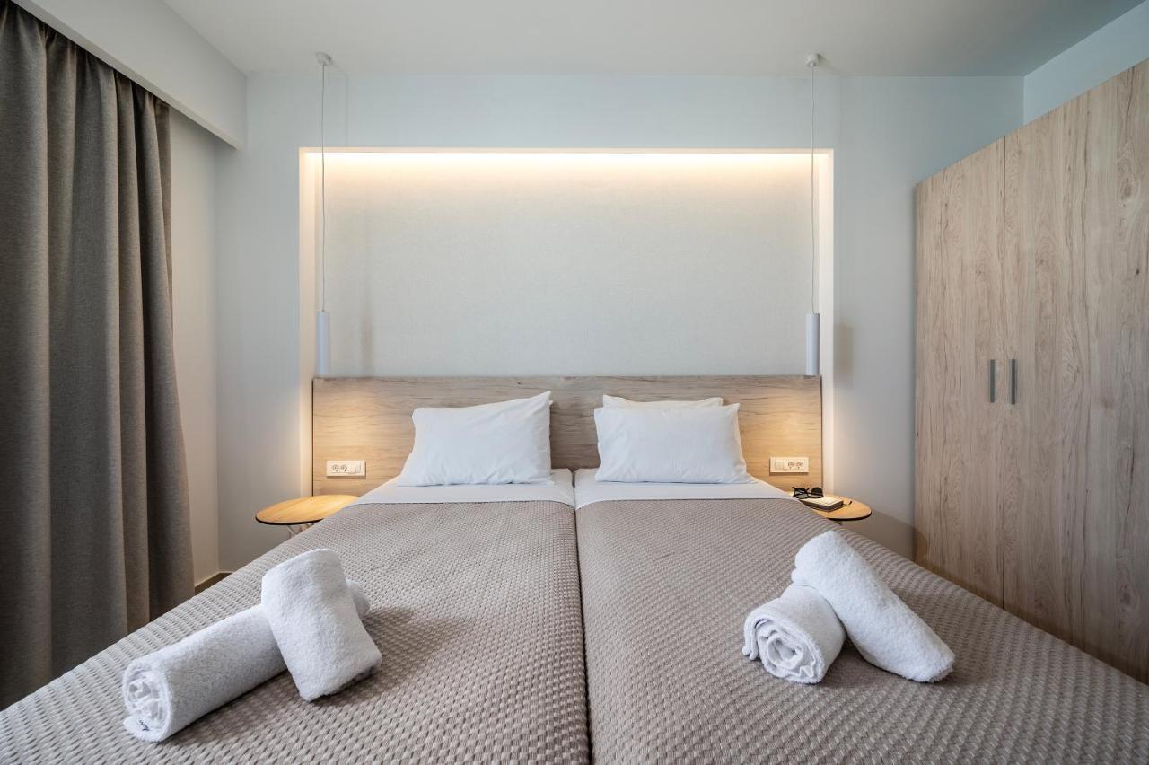 Mythos Suites Hotel Тигаки Экстерьер фото