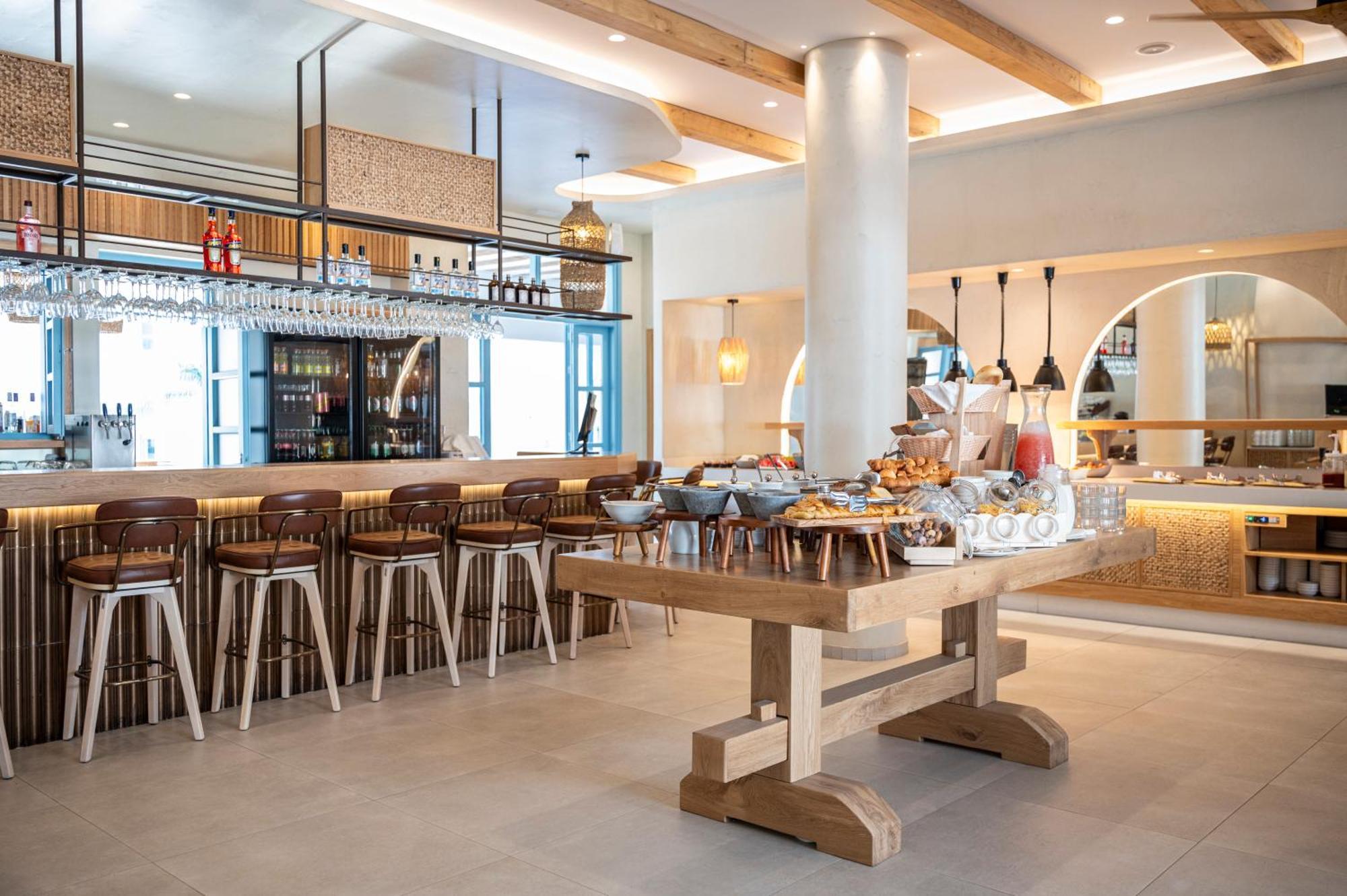 Mythos Suites Hotel Тигаки Экстерьер фото